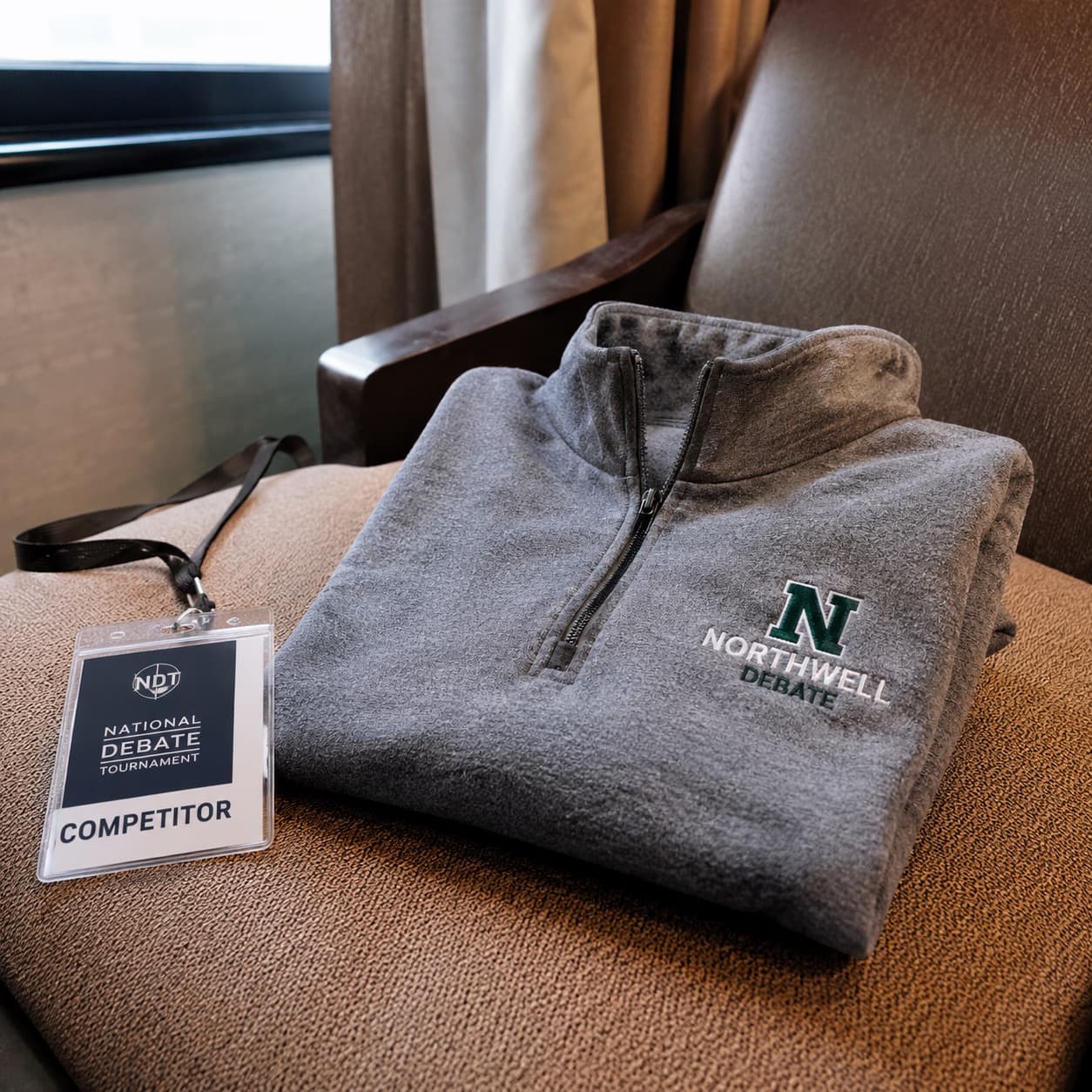 Quarter-zips for a debate travel squad