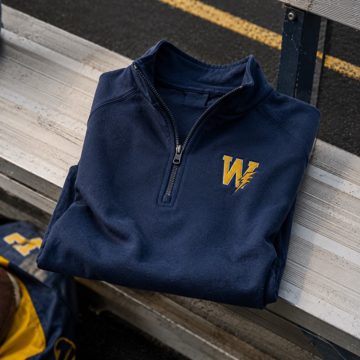 Embroidered quarter-zips for coaches and travel squads